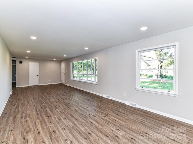 spare room featuring hardwood / wood-style floors