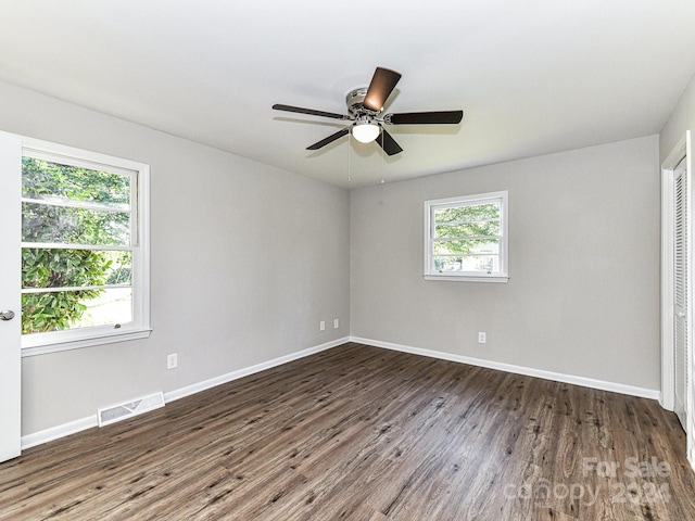 unfurnished room featuring ceiling fan and wood-type flooring