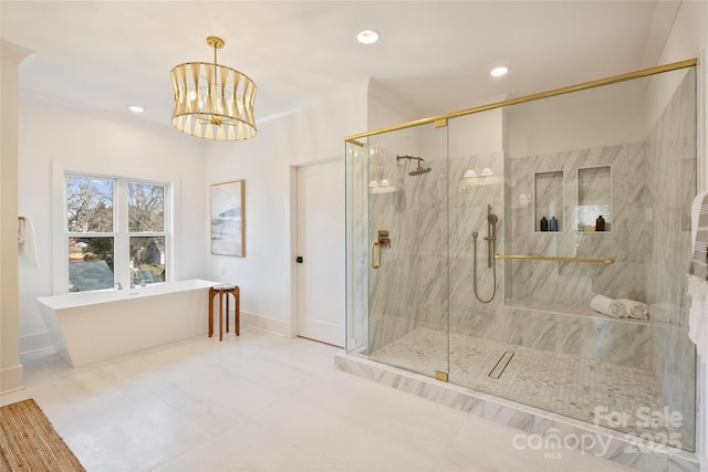 bathroom with plus walk in shower and an inviting chandelier