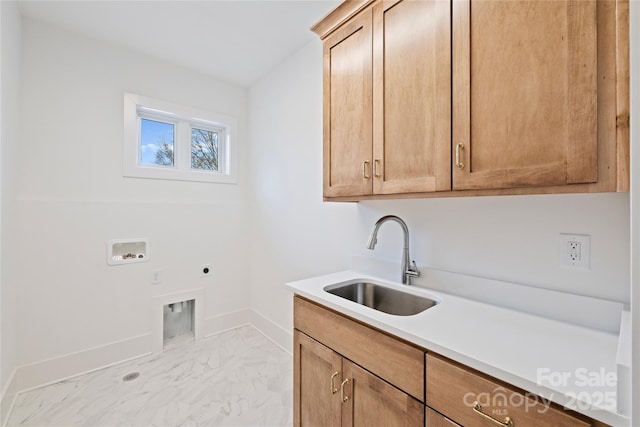 clothes washing area with washer hookup, sink, electric dryer hookup, and cabinets