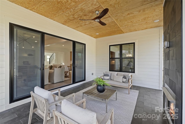 view of patio featuring ceiling fan and outdoor lounge area