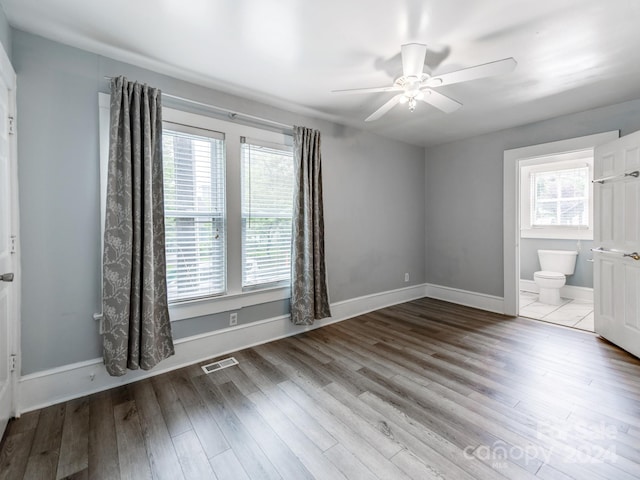 spare room with ceiling fan and light hardwood / wood-style floors