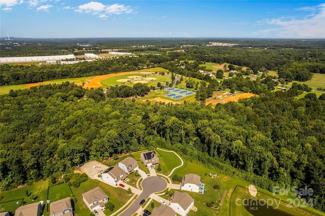 aerial view with a residential view and a wooded view