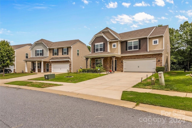 view of front of property with a garage, stone siding, a front lawn, and concrete driveway