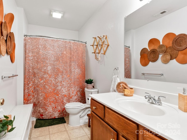 bathroom featuring visible vents, vanity, and toilet