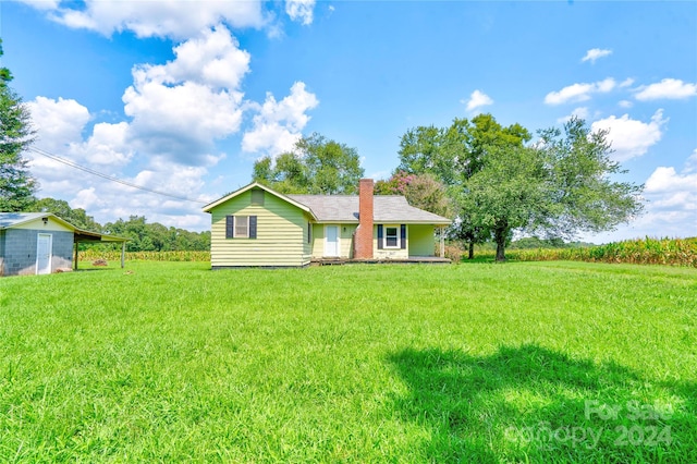 ranch-style house with a front yard