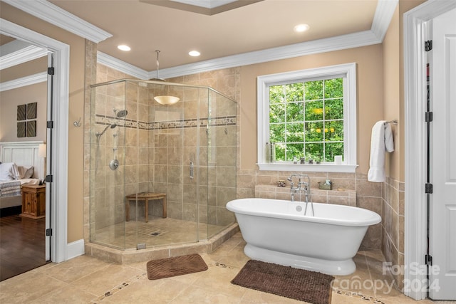 bathroom featuring ornamental molding, plus walk in shower, and tile patterned flooring