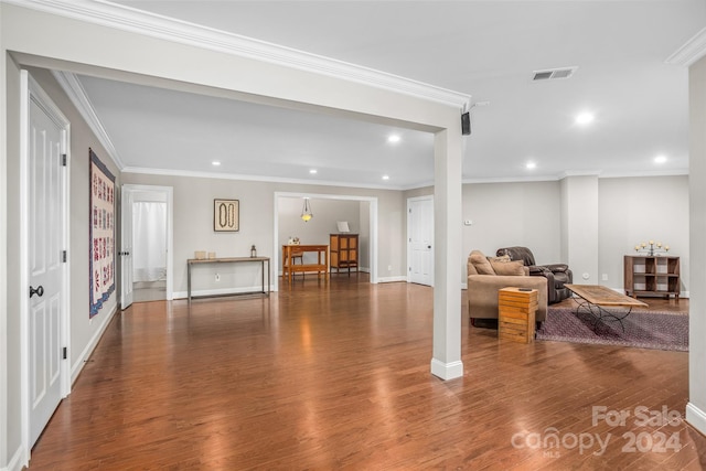 living room featuring ornamental molding and hardwood / wood-style floors