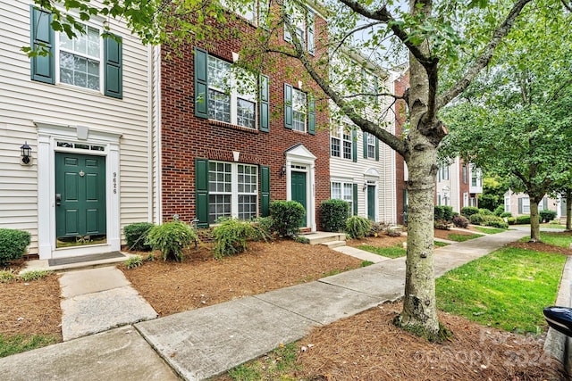 multi unit property with brick siding