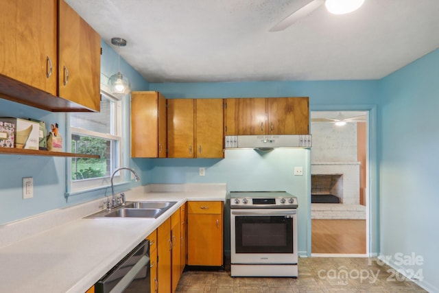 kitchen featuring black dishwasher, light hardwood / wood-style floors, sink, range with electric stovetop, and ceiling fan