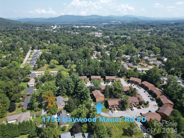 birds eye view of property featuring a mountain view