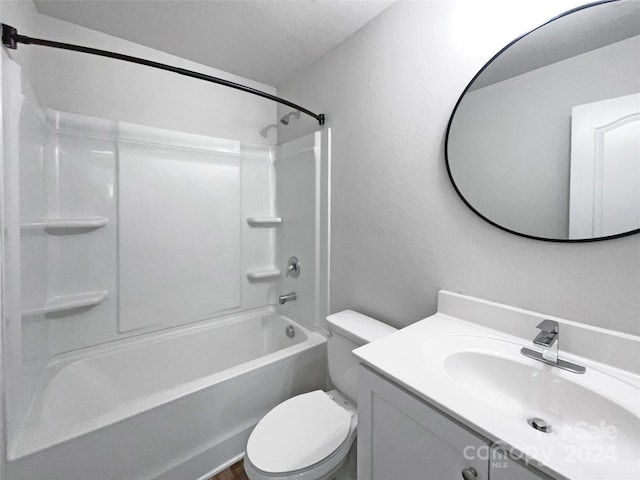 full bathroom with vanity,  shower combination, and toilet