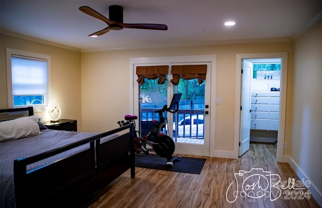 bedroom featuring crown molding, hardwood / wood-style flooring, access to outside, and ceiling fan