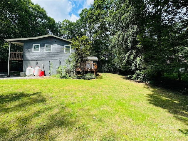 view of yard featuring a deck