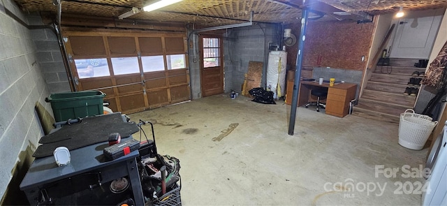 garage featuring gas water heater