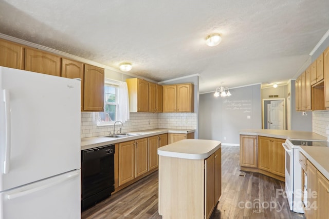 kitchen featuring tasteful backsplash, hardwood / wood-style floors, ornamental molding, a center island, and white appliances