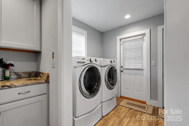 58 Greenwood Fields Dr, Asheville, NC 28804 - clothes washing area featuring light wood-type flooring, cabinet space, washing machine and clothes dryer, and recessed lighting