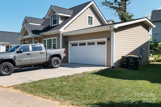 58 Greenwood Fields Dr, Asheville, NC 28804 - view of side of home featuring a garage, driveway, a yard, and a shingled roof