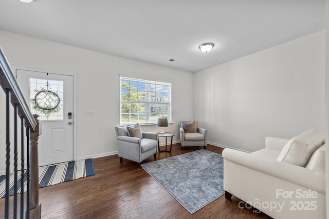 interior space featuring plenty of natural light and dark wood-type flooring