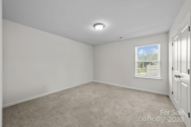 view of carpeted spare room