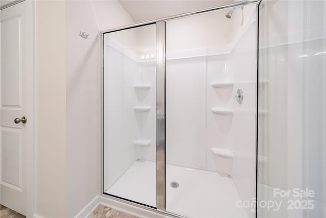 bathroom with a stall shower