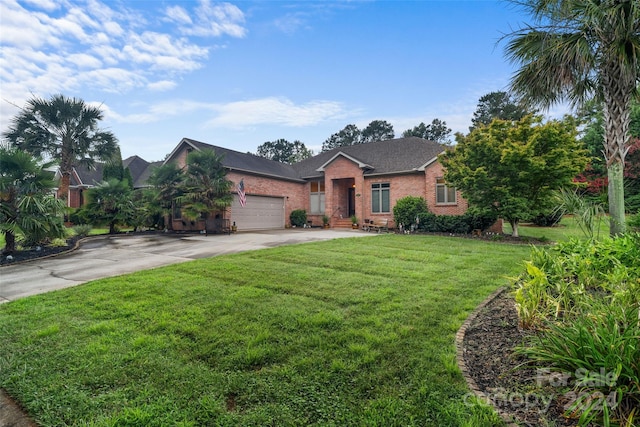 view of front of property featuring a front lawn and a garage