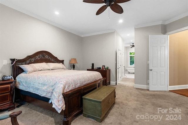 carpeted bedroom featuring ceiling fan and ornamental molding