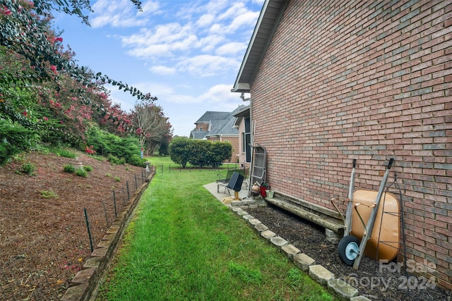 view of property exterior with a yard