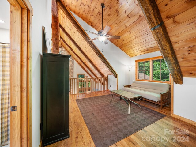 interior space featuring wooden ceiling, vaulted ceiling, and wood-type flooring