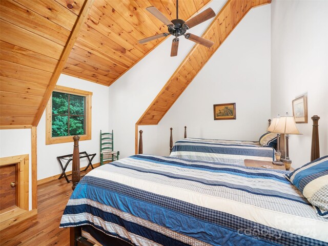 bedroom with ceiling fan, hardwood / wood-style flooring, wood ceiling, and vaulted ceiling