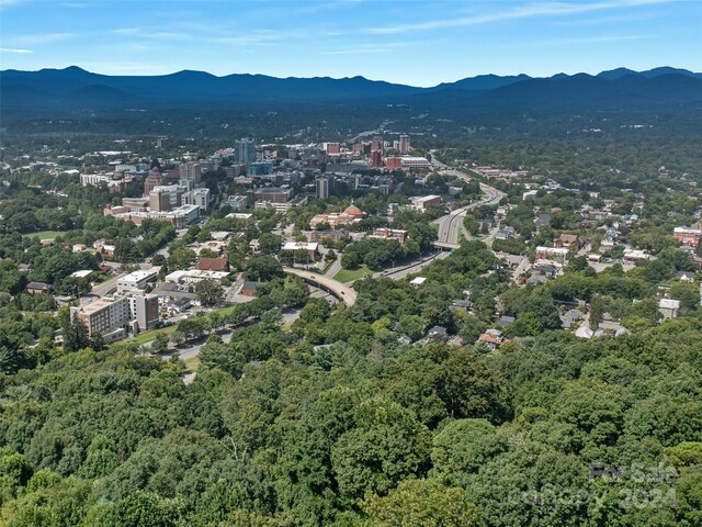 drone / aerial view featuring a mountain view