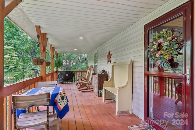 deck with covered porch