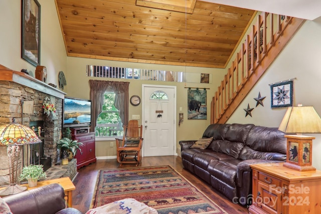 living room featuring dark wood-type flooring, wood ceiling, vaulted ceiling, and stairway