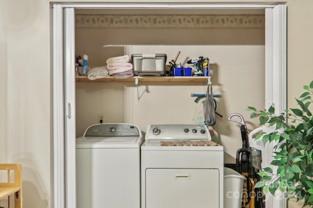 clothes washing area with laundry area and washing machine and dryer