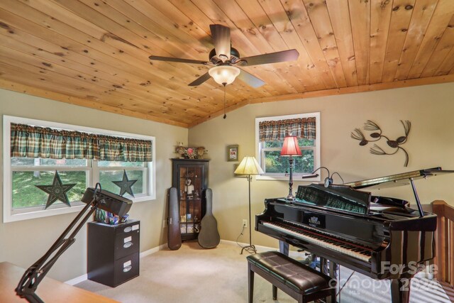 misc room with a wealth of natural light, ceiling fan, wooden ceiling, and light carpet