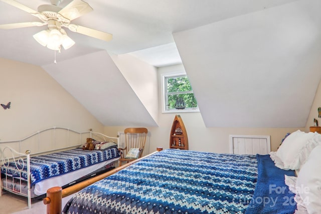 bedroom with lofted ceiling and ceiling fan