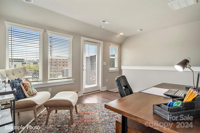 office space with wood finished floors, visible vents, baseboards, lofted ceiling, and recessed lighting