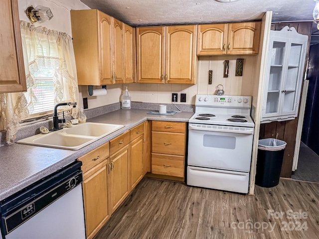 kitchen with stainless steel dishwasher, dark hardwood / wood-style floors, sink, white range with electric cooktop, and a textured ceiling