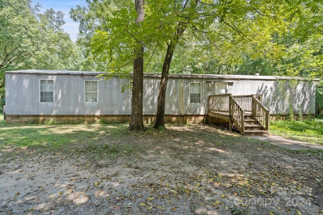 view of yard featuring a deck