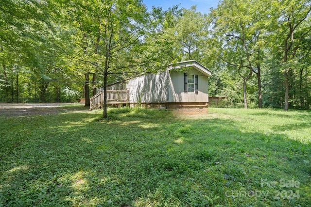 view of yard with a deck