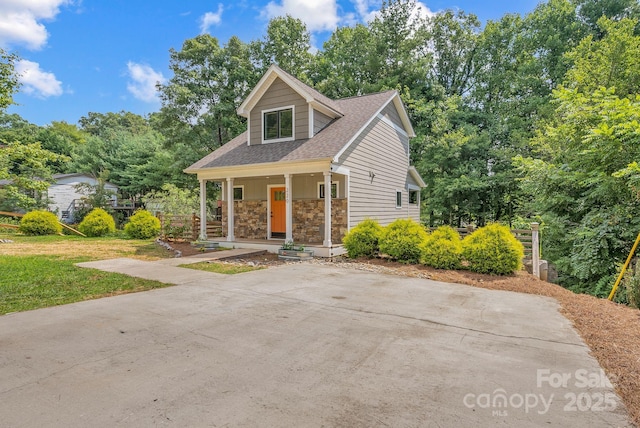 view of front of property featuring covered porch