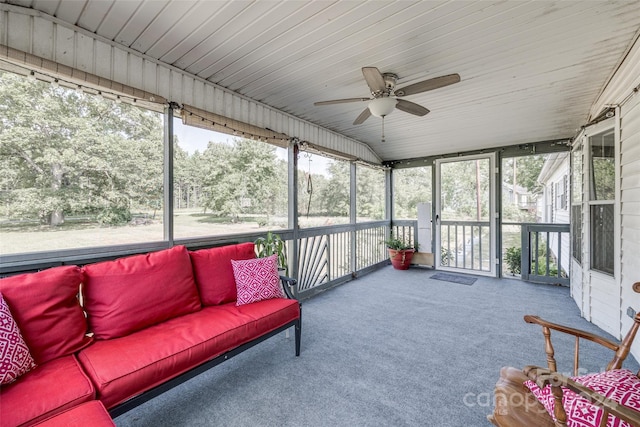 sunroom with vaulted ceiling and ceiling fan