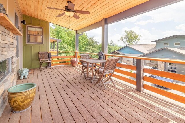 wooden terrace with ceiling fan