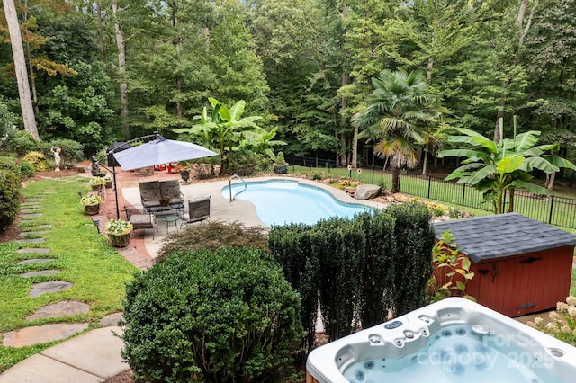 view of swimming pool featuring a patio