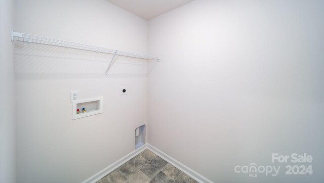 laundry area with tile patterned floors, electric dryer hookup, and washer hookup