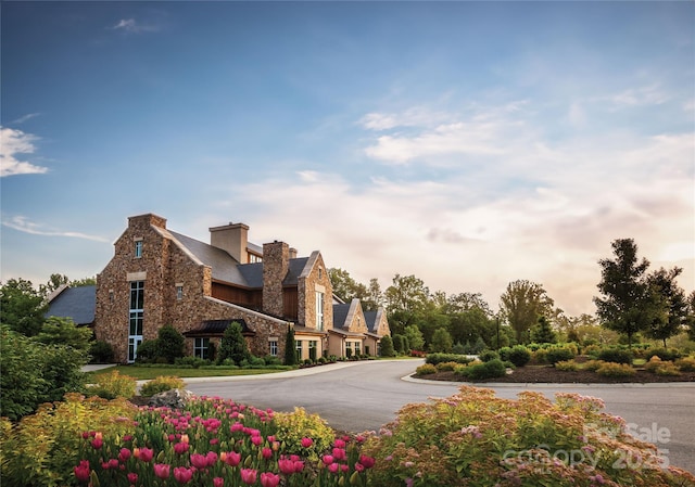 view of outdoor building at dusk