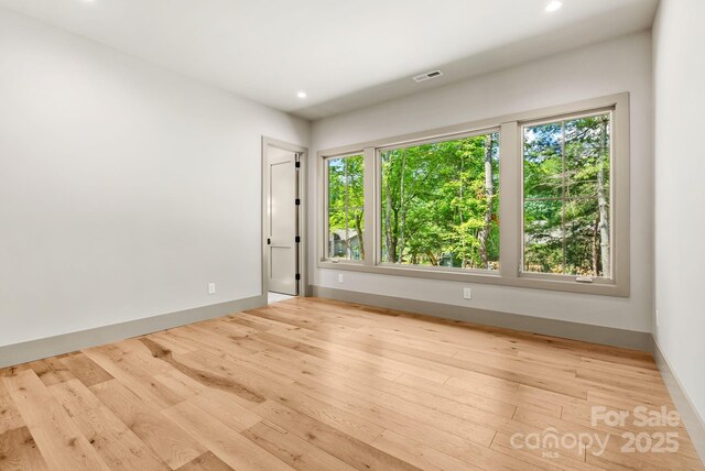 11 Nestlewood Dr Unit 310, Arden, NC 28704 - unfurnished room with wood finished floors and recessed lighting