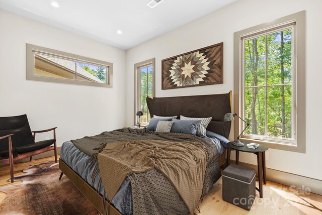11 Nestlewood Dr Unit 310, Arden, NC 28704 - bedroom with wood finished floors and recessed lighting