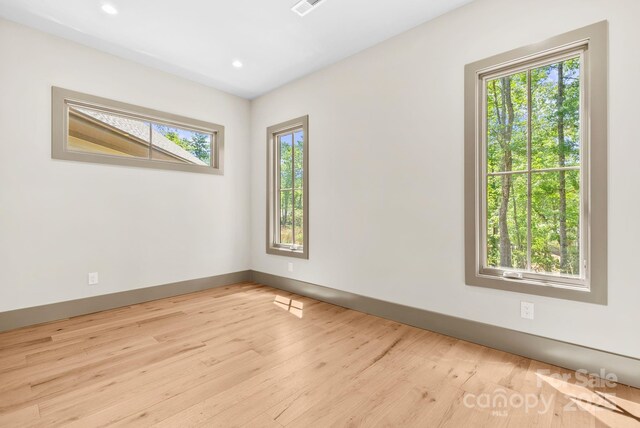 11 Nestlewood Dr Unit 310, Arden, NC 28704 - empty room featuring wood finished floors and recessed lighting