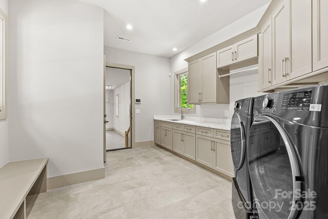 11 Nestlewood Dr Unit 310, Arden, NC 28704 - laundry room featuring independent washer and dryer, cabinet space, and recessed lighting